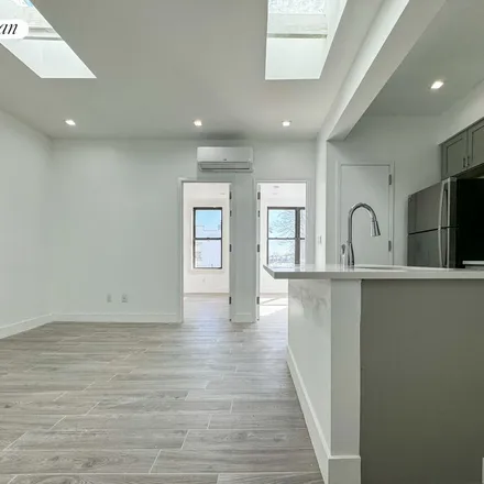 Rent this 2 bed apartment on 76-12 Rockaway Boulevard in New York, NY 11421