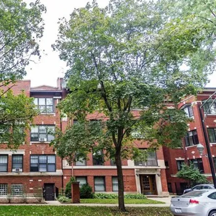 Rent this 4 bed house on 5211 S Greenwood Ave Apt 1 in Chicago, Illinois