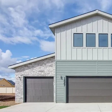 Buy this 4 bed house on Dovekie Street in Caldwell, ID 83651