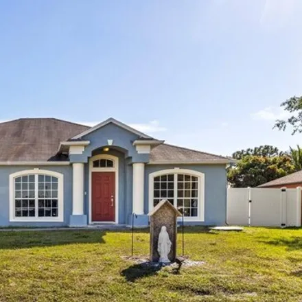 Buy this 3 bed house on 2519 Southwest Fondura Road in Port Saint Lucie, FL 34953