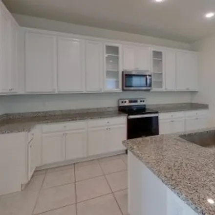 Rent this 4 bed apartment on 14339 59Th Circle East in Lorraine Farms, Bradenton