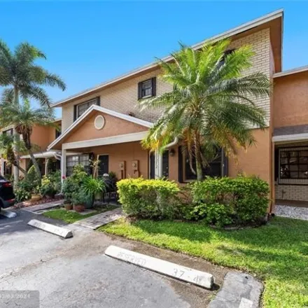 Buy this 2 bed townhouse on 10358 Northwest 3rd Street in Pembroke Pines, FL 33026