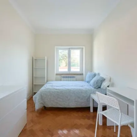 Rent this 3 bed room on Rua Carlos Malheiro Dias 10 in 1700-108 Lisbon, Portugal