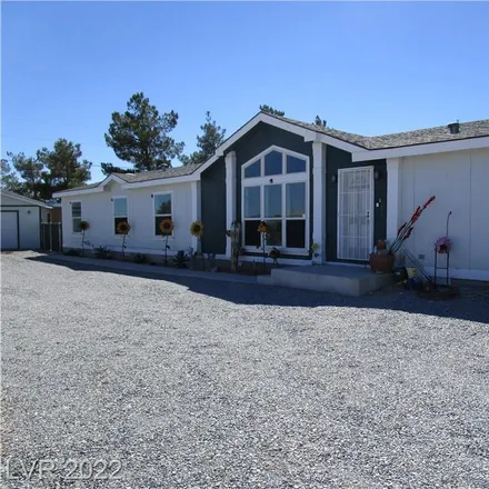 Buy this 4 bed house on 910 Luella Court in Pahrump, NV 89048