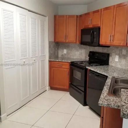 Rent this 2 bed condo on 6284 Northwest 186th Street in Miami-Dade County, FL 33015
