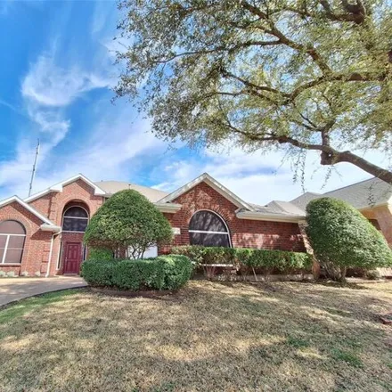 Buy this 4 bed house on 7110 Woodsprings Drive in Garland, TX 75044