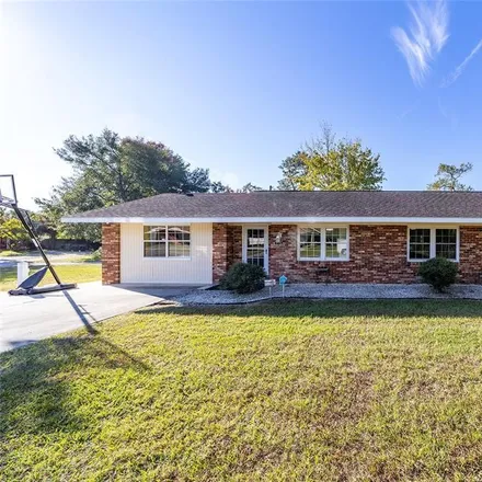 Buy this 4 bed house on 3120 Northeast 8th Place in Ocala, FL 34470