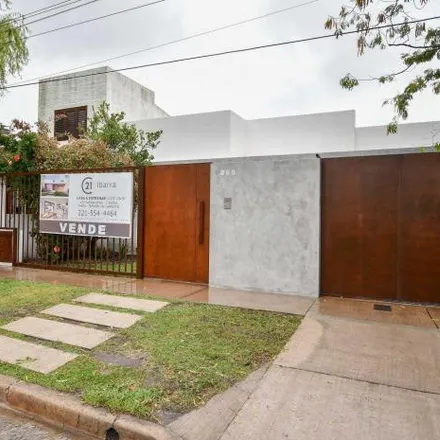 Buy this 3 bed house on Calle 473 in Partido de La Plata, 1896 City Bell