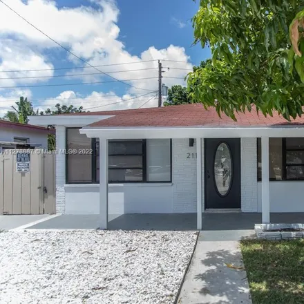 Rent this 3 bed house on 211 Northeast 41st Street in North Andrew Gardens, Broward County