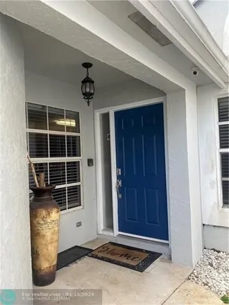 Rent this 3 bed house on Cache in Coral Springs, FL 33065