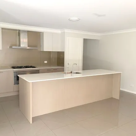 Rent this 4 bed apartment on 41 Cedar Cutters Crescent in Cooranbong NSW 2265, Australia