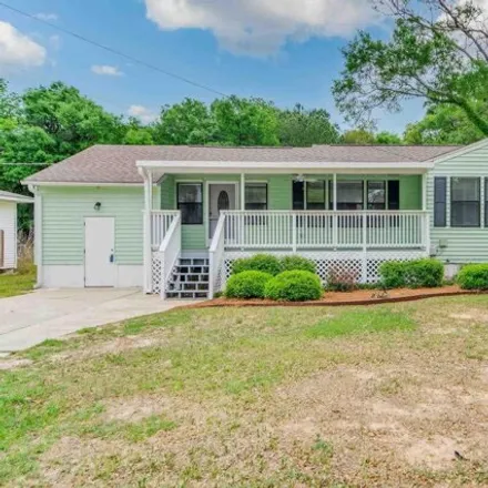 Buy this 4 bed house on 683 Lakewood Road in Escambia County, FL 32507