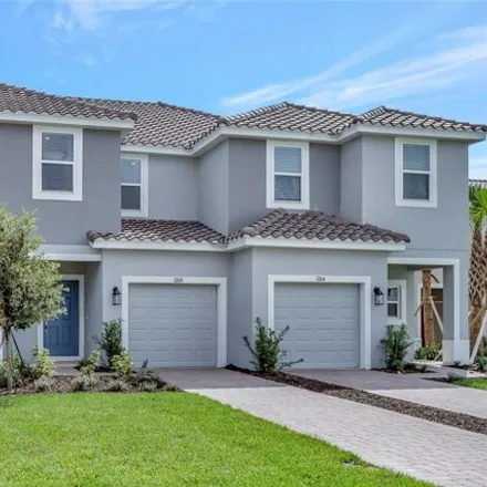 Rent this 3 bed townhouse on 1257 Lago Vista Court in Osceola County, FL 34746