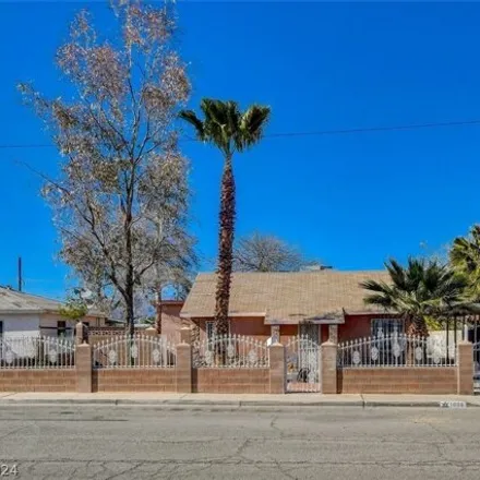 Buy this 3 bed house on 1674 East Mc Donald Avenue in North Las Vegas, NV 89030