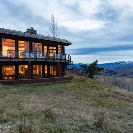 Buy this 4 bed house on 2001 North Spirit Dance Road in Teton County, WY 83001