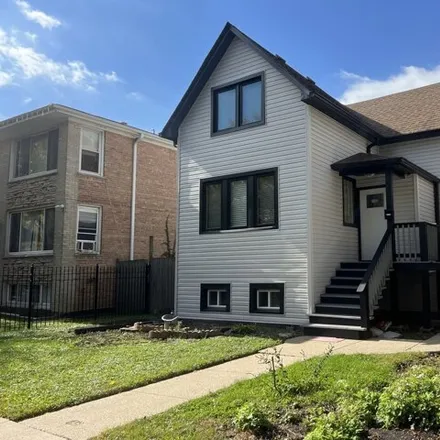 Buy this 3 bed house on 1426 North Laramie Avenue in Chicago, IL 60651