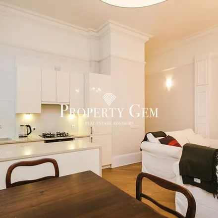Rent this 2 bed apartment on Koszykowa 61A in 00-667 Warsaw, Poland