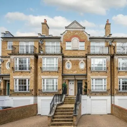 Rent this 3 bed townhouse on Chapman House in Chapman Square, London