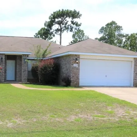 Rent this 4 bed house on 8600 High School Boulevard in Navarre, FL 32566