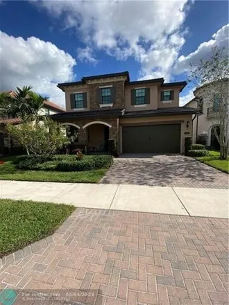 Rent this 5 bed house on 9240 Solstice Circle in Parkland, FL 33076