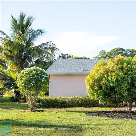 Buy this 2 bed house on 6125 Rainbow Circle in Greenacres, FL 33463
