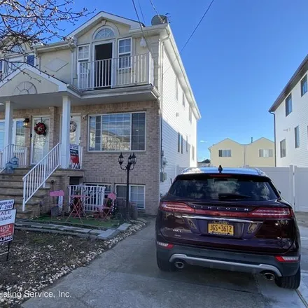 Buy this 4 bed house on 78 Pitney Avenue in New York, NY 10309