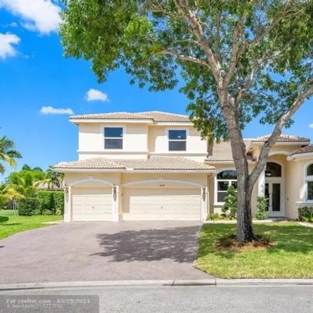 Buy this 5 bed house on 4955 Northwest 110th Way in Coral Springs, FL 33076