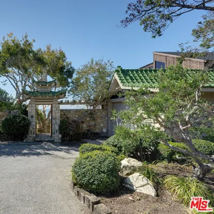 Rent this 3 bed house on Cholada Thai Beach Cuisine in 18763 Pacific Coast Highway, Malibu