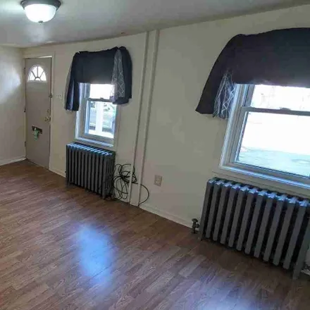 Rent this 2 bed house on 128 W. Elm Street