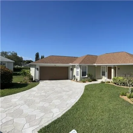 Rent this 4 bed house on 700 Cherry Blossom Court in Orangetree, Collier County