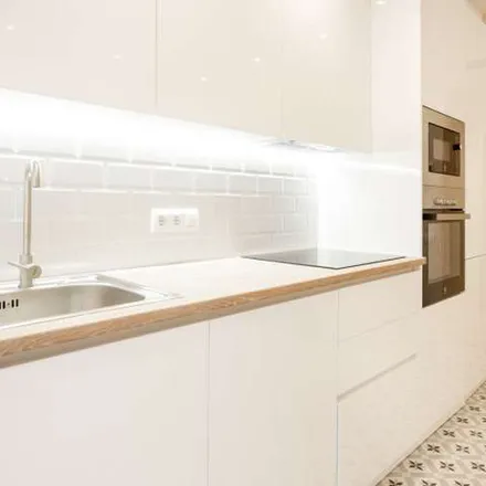 Rent this 4 bed apartment on Carrer de Ventura Plaja in 08001 Barcelona, Spain