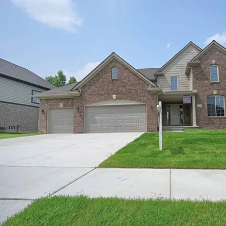 Buy this 4 bed house on 22101 Tahquamenon Court in Macomb Township, MI 48042