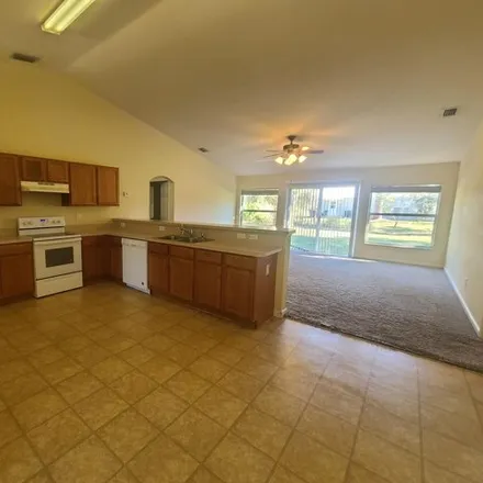 Image 3 - 153 Battersea Avenue Northeast, Palm Bay, FL 32907, USA - House for rent