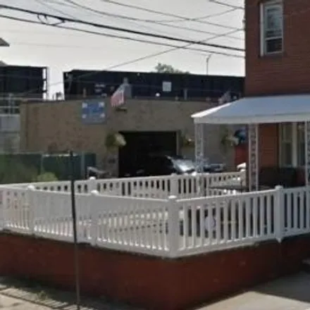Rent this 3 bed house on 58 E 14th St in Bayonne, New Jersey