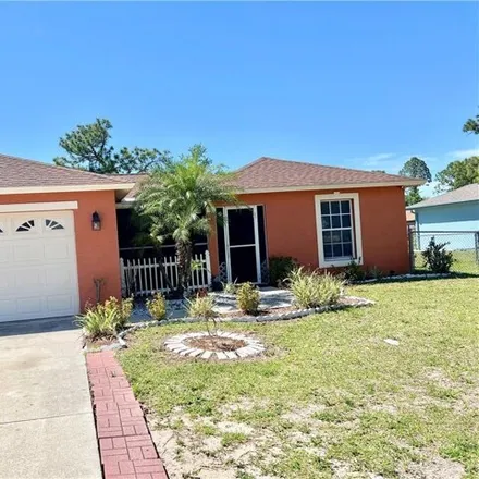 Rent this 3 bed house on 590 Bell Boulevard in Lehigh Acres, FL 33974