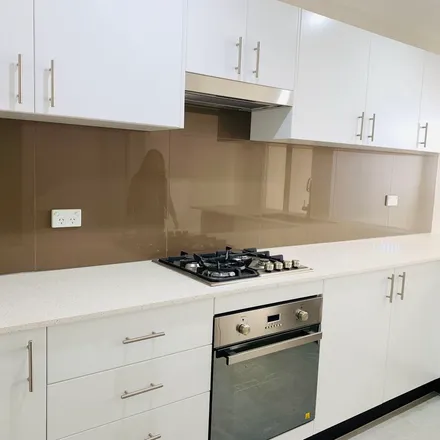 Rent this 4 bed apartment on Koi Apartments in 45-47 Peel Street, Canley Heights NSW 2166