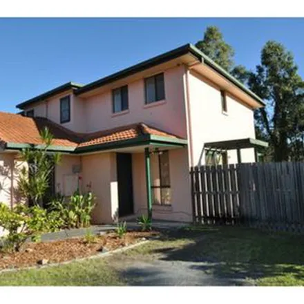 Rent this 3 bed townhouse on Greenacre Drive in Parkwood QLD 4214, Australia