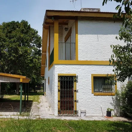 Buy this 2 bed townhouse on Thiago y Agustín in Florencio Sánchez, El Povenir