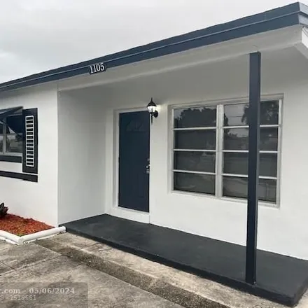 Rent this 4 bed house on 1113 West 26th Court in Riviera Beach, FL 33404