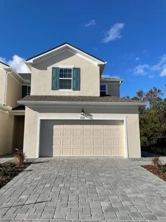 Rent this 3 bed house on Spring Palms Loop in Orange County, FL 32828