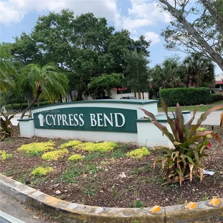Rent this 2 bed condo on 2209 South Cypress Bend Drive