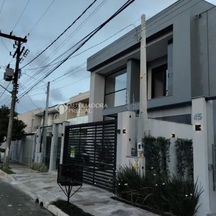 Buy this 3 bed house on Rua Pedro Canizio Müller in Estância Velha, Canoas - RS