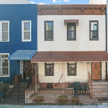 Buy this 6 bed house on 896 Willoughby Avenue in New York, NY 11221