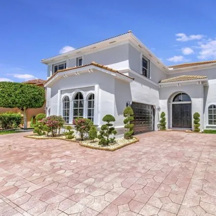 Buy this 6 bed house on 10607 Keystone Ct in Wellington, Florida