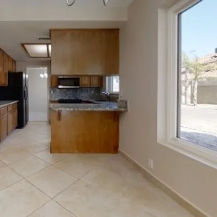 Rent this 4 bed apartment on 7801 West Columbine Drive in Windmill, Peoria
