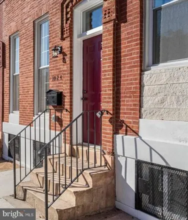 Buy this 4 bed house on 1024 North Fulton Avenue in Baltimore, MD 21217