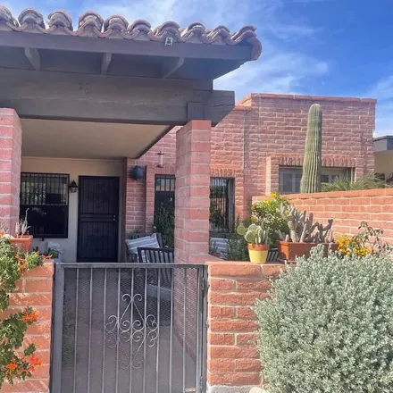 Rent this 3 bed townhouse on 4877 E Placita Arenosa