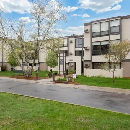 Buy this 2 bed condo on Westmoreland Hills in 4530 Park Commons Drive, Saint Louis Park