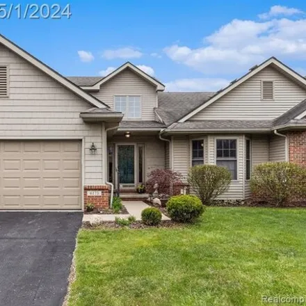 Buy this 4 bed condo on 6104 Mountain Laurel Drive in Brighton, MI 48116