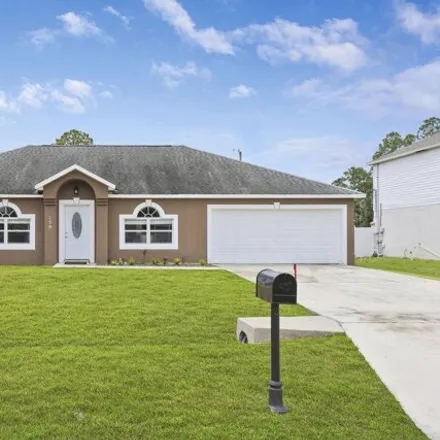 Buy this 3 bed house on 150 Sw Twigg Ave in Port Saint Lucie, Florida